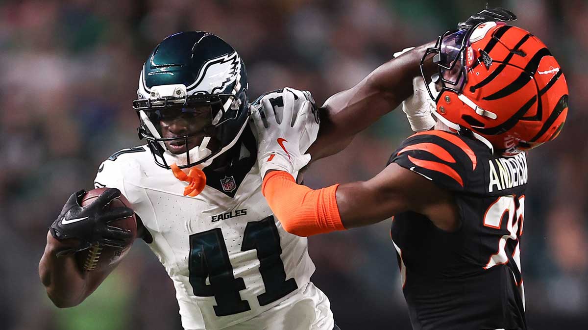 Philadelphia Eagles wide receiver Darius Cooper (41) runs with the ball against Cincinnati Bengals safety Tycen Anderson (26) after a catch during the second quarter at Lincoln Financial Field.
