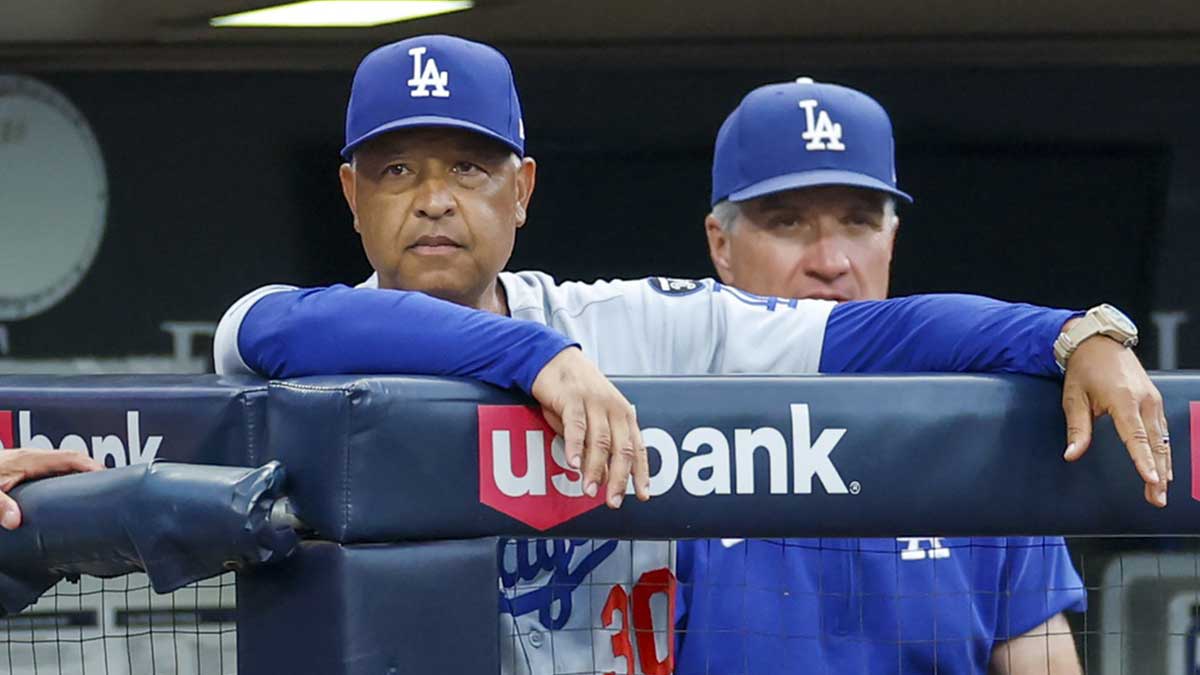 Los Angeles Dodgers manager Dave Roberts (30) watches play during the second inning against the San Diego Padres at Petco Park.