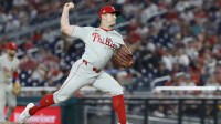 Philadelphia Phillies pitcher David Robertson (30) pitches against the Washington Nationals during the ninth inning at Nationals Park.