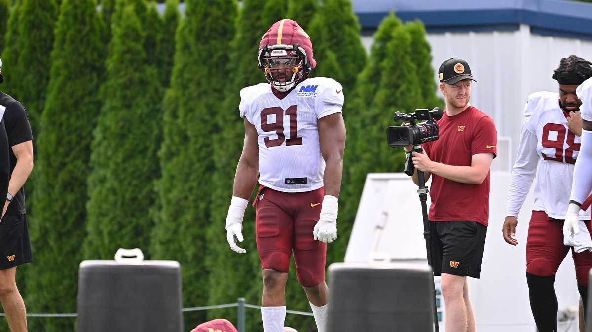 Washington Commanders defensive end Deatrich Wise Jr. (91) waits for the start of a drill at training camp at Gillette Stadium.