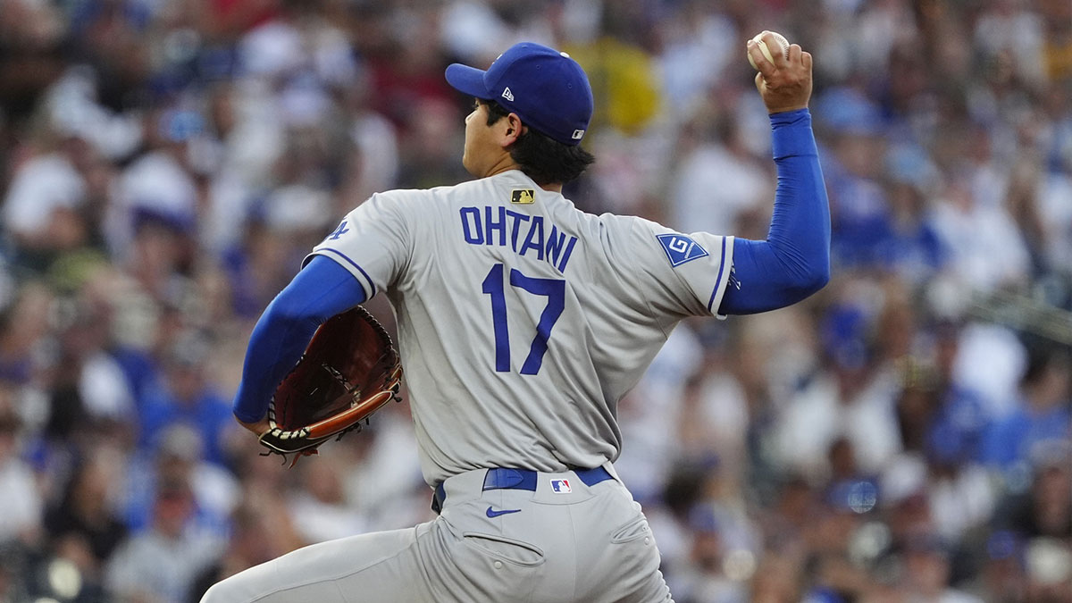 Los Angeles Dodgers two-way player Shohei Ohtani (17) delivers a pitch in third inning against the Colorado Rockies at Coors Field. Mandatory Credit: Ron Chenoy-Imagn Images