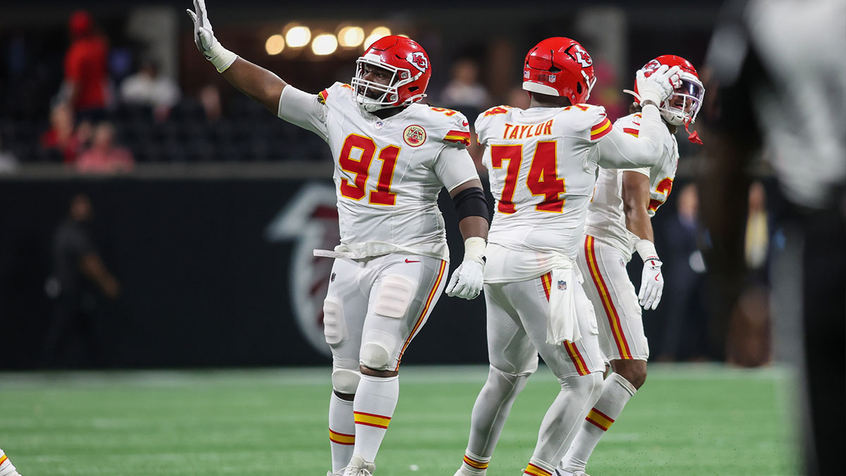 Kansas City Chiefs defensive tackle Derrick Nnadi (91) waves to the crowd after a stop on fourth down against the Atlanta Falcons in the fourth quarter at Mercedes-Benz Stadium.