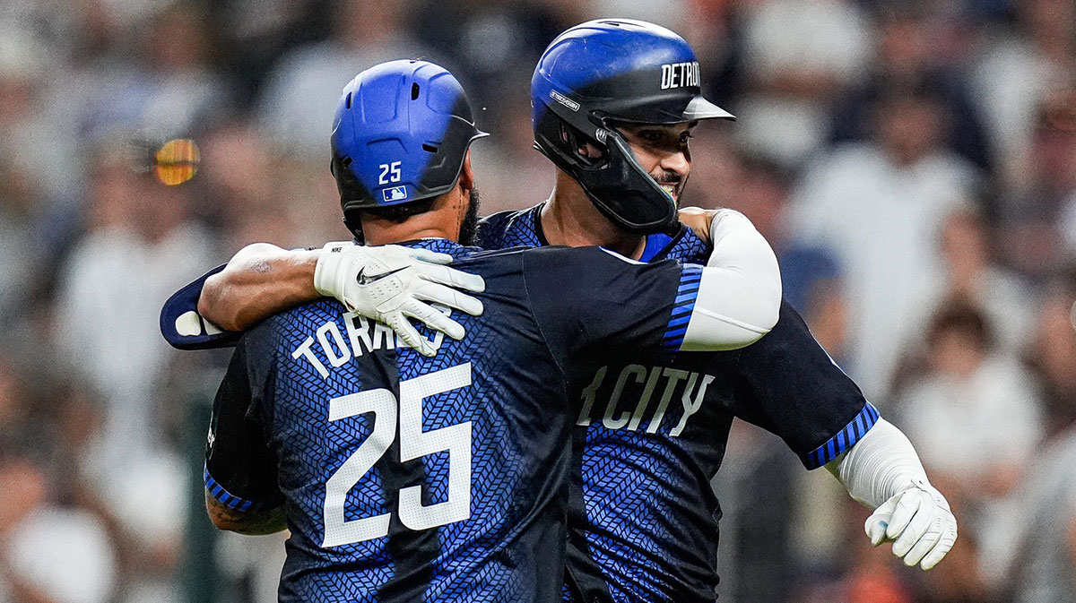 Detroit Tigers left fielder Riley Greene (31) hugs second base Gleyber Torres (25) to celebrate a 2-run home run against the Kansas City Royals during the sixth inning at Comerica Park in Detroit on Friday, August 22, 2025.