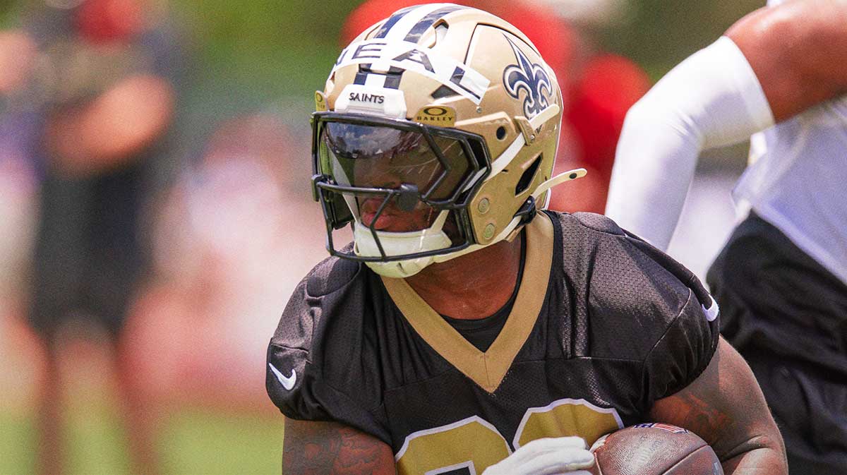 New Orleans Saints running back Devin Neal (30) on running back drills during minicamp at Ochsner Sports Performance Center.