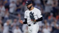 New York Yankees relief pitcher Devin Williams (38) reacts after defeating the Tampa Bay Rays at Yankee Stadium.