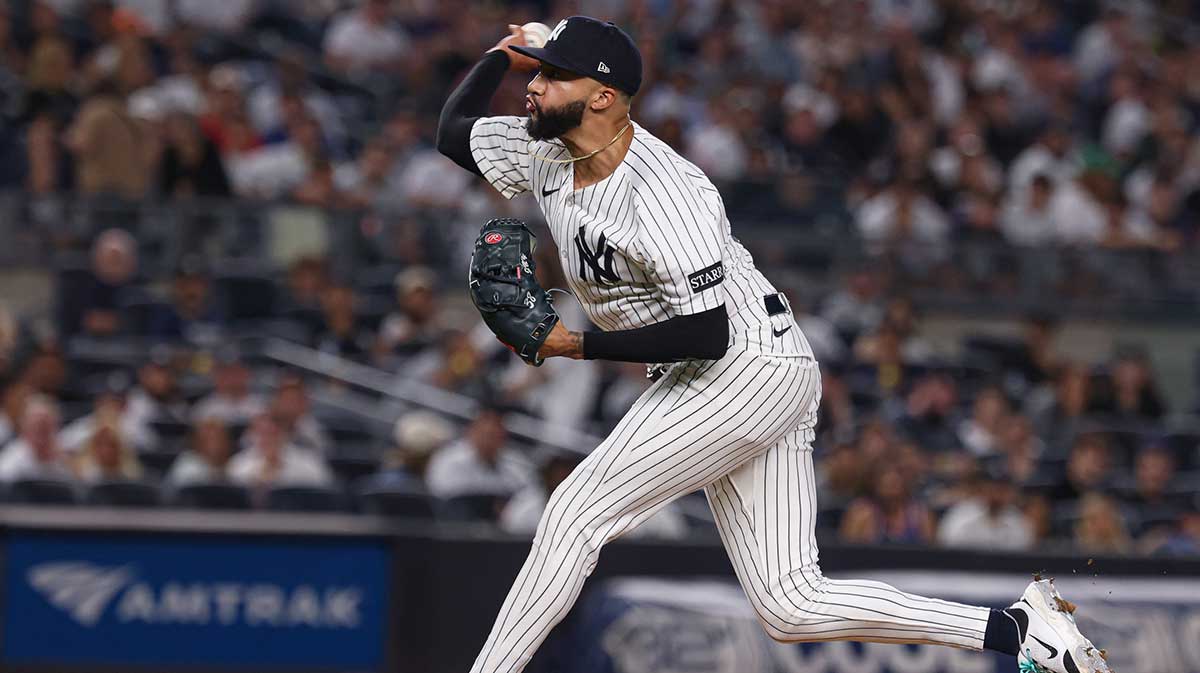 New York Yankees relief pitcher Devin Williams (38) delivers a pitch during the tenth inning against the Houston Astros