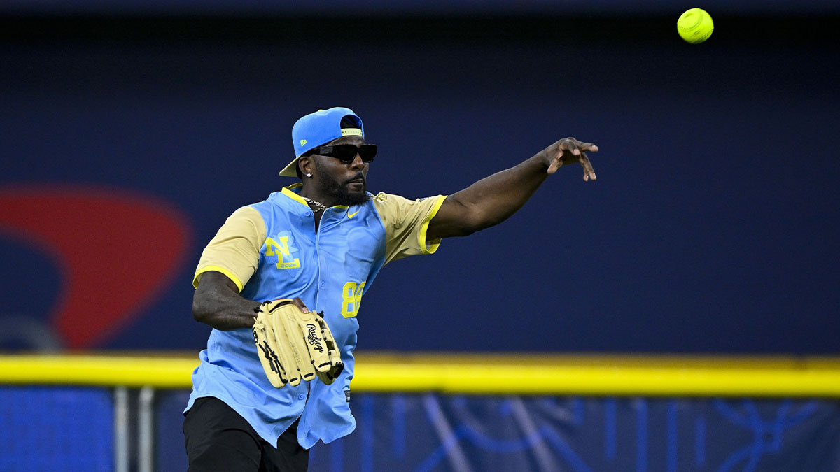 NFL pro bowl wide receiver Dez Bryant (88) of the National League throws the ball during the 2024 All Star Celebrity Softball Game at Globe Life Field.
