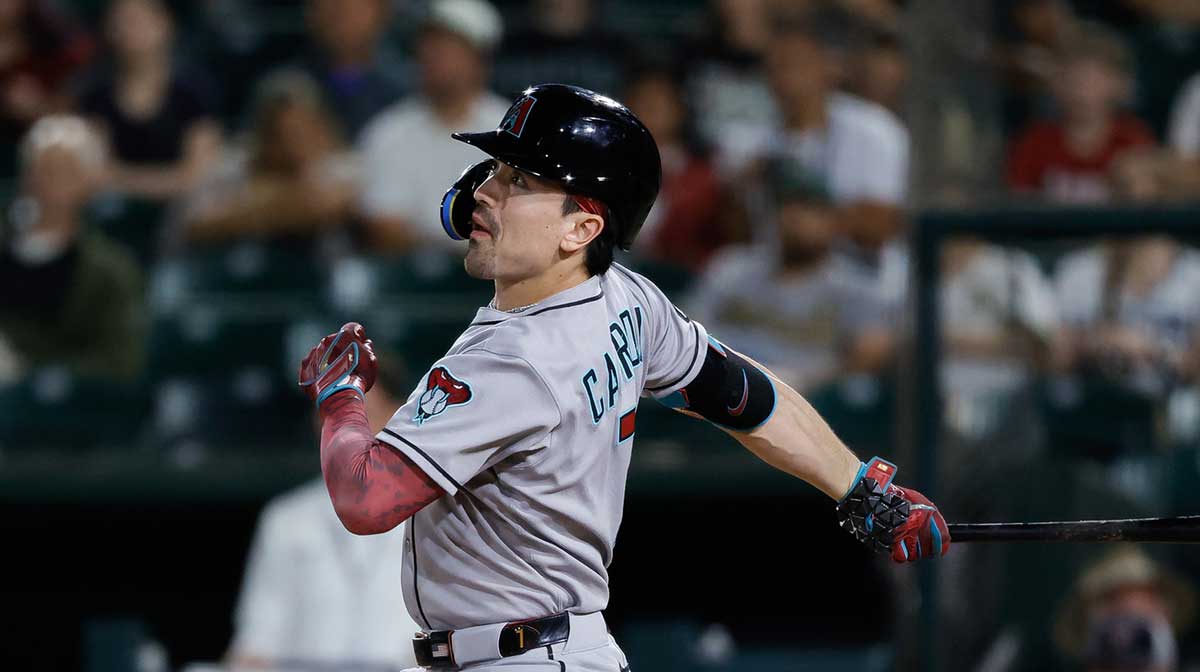 Arizona Diamondbacks right fielder Corbin Carroll (7) hits an RBI sacrifice fly during the sixth inning against the Athletics at Sutter Health Park.