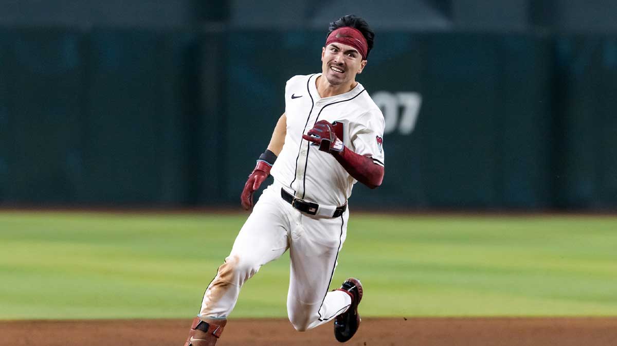 Diamondbacks outfielder Corbin Carroll runs to third