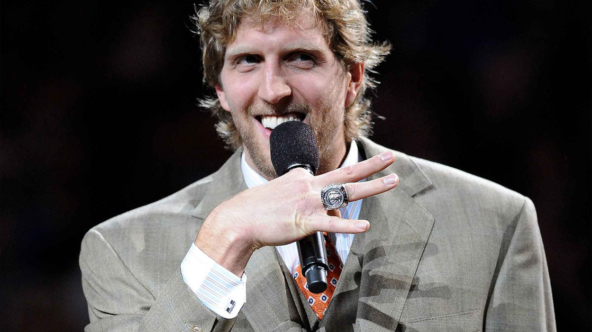 Dallas Mavericks power forward Dirk Nowitzki (41) receives his NBA championship ring before the game against the Minnesota Timberwolves at the American Airlines Center. The Timberwolves defeated the Mavericks 105-90.