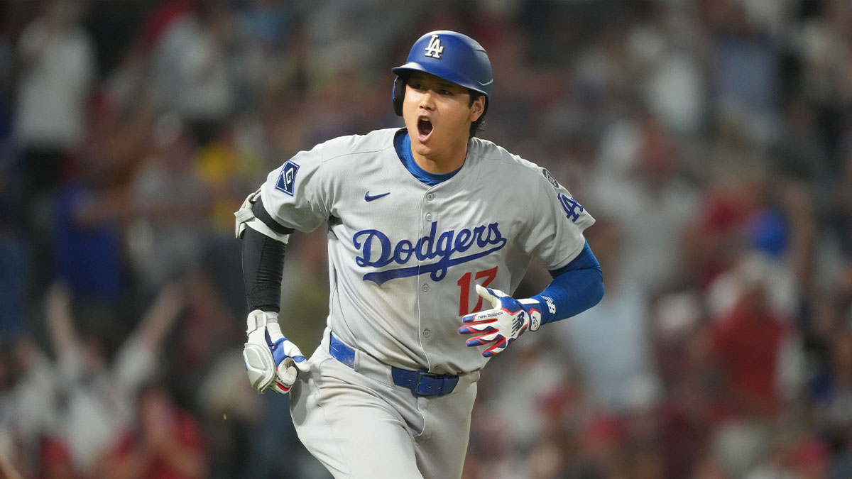 Los Angeles Dodgers designated hitter Shohei Ohtani (17) reacts after hitting a home run in the ninth inning against the Los Angeles Angels at Angel Stadium.
