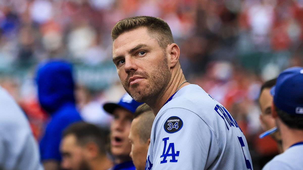 Los Angeles Dodgers first baseman Freddie Freeman (5) sits in the dugout before the game against the Cincinnati Reds at Great American Ball Park.