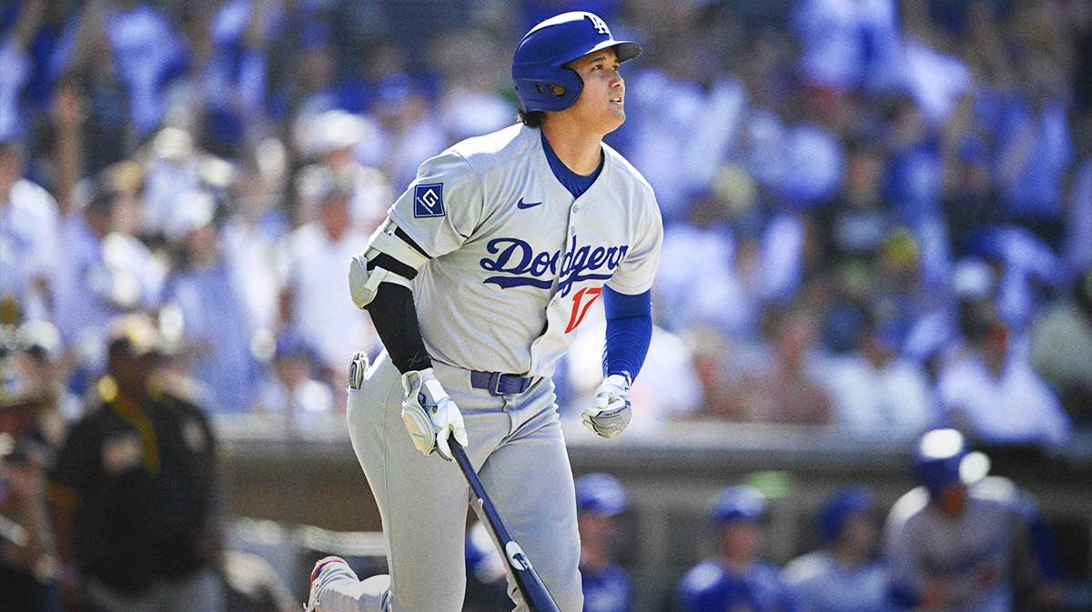Los Angeles Dodgers designated hitter Shohei Ohtani (17) hits a solo home run during the ninth inning against the San Diego Padres at Petco Park.