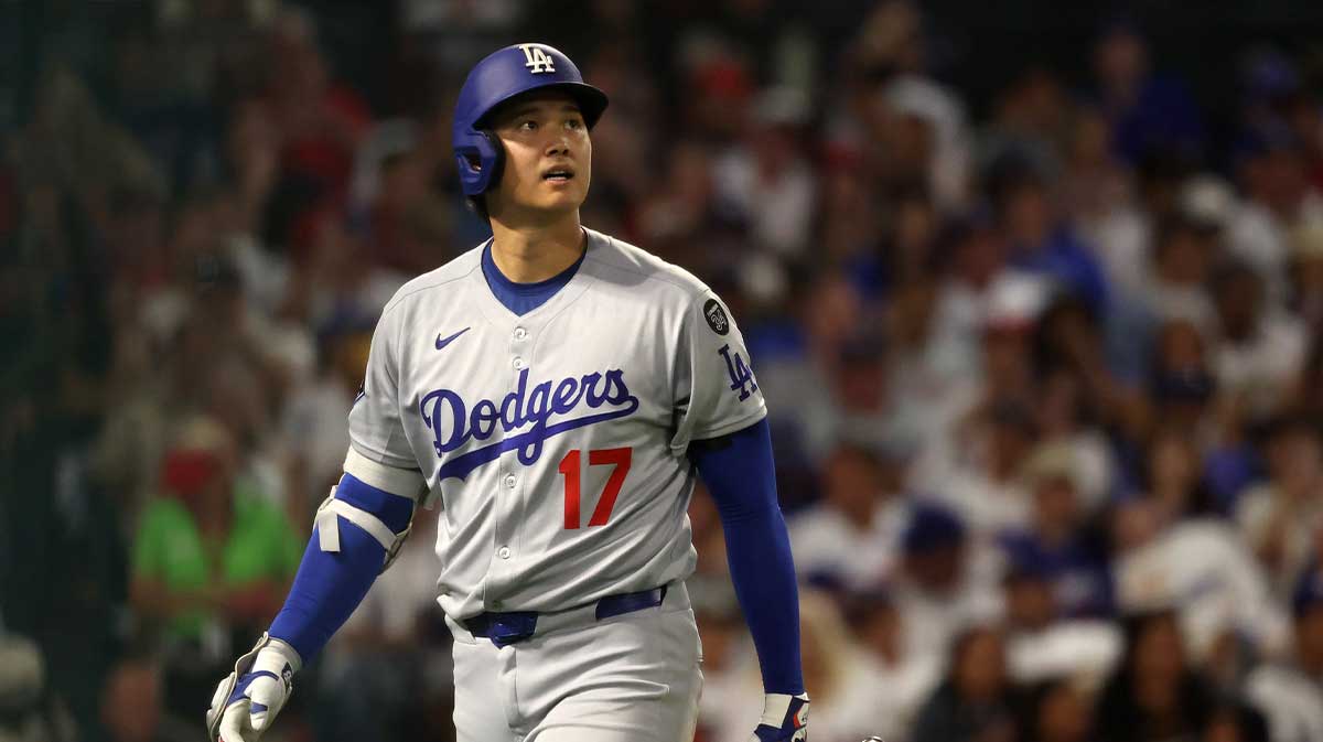 Los Angeles Dodgers two-way player Shohei Ohtani (17) looks on after strikes out during the eighth inning against the Los Angeles Angels at Angel Stadium.