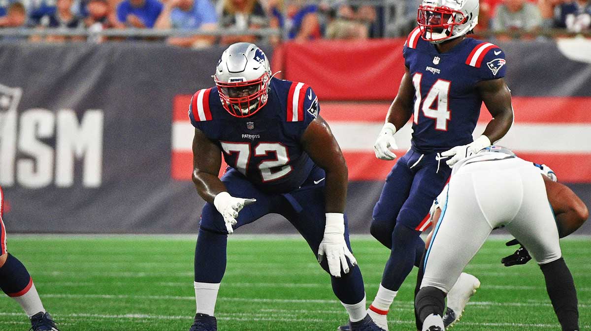 New England Patriots offensive tackle Yodny Cajuste (72) lines up during the first half of a preseason game against the Carolina Panthers at Gillette Stadium.