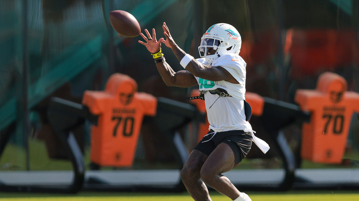 Miami Dolphins wide receiver Tyreek Hill (10) catches the football during training camp at Baptist Health Training Complex.