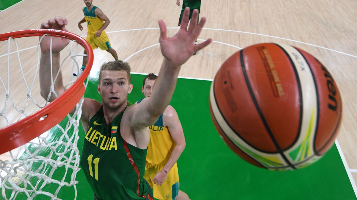 Lithuania power forward/center Domantas Sabonis (11) goes for a rebound against Australia during the men's basketball quarterfinals in the Rio 2016 Summer Olympic Games at Carioca Arena 1.