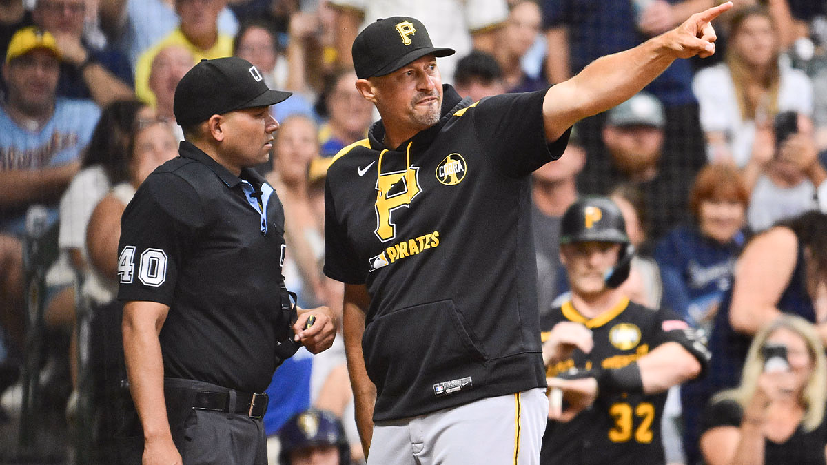 Pittsburgh Pirates manager Don Kelly argues with home plate umpire Roberto Ortiz in the fifth inning against the Milwaukee Brewers at American Family Field.