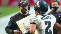 Philadelphia Eagles head coach Doug Pederson with quarterback Jalen Hurts (2) against the Arizona Cardinals at State Farm Stadium.