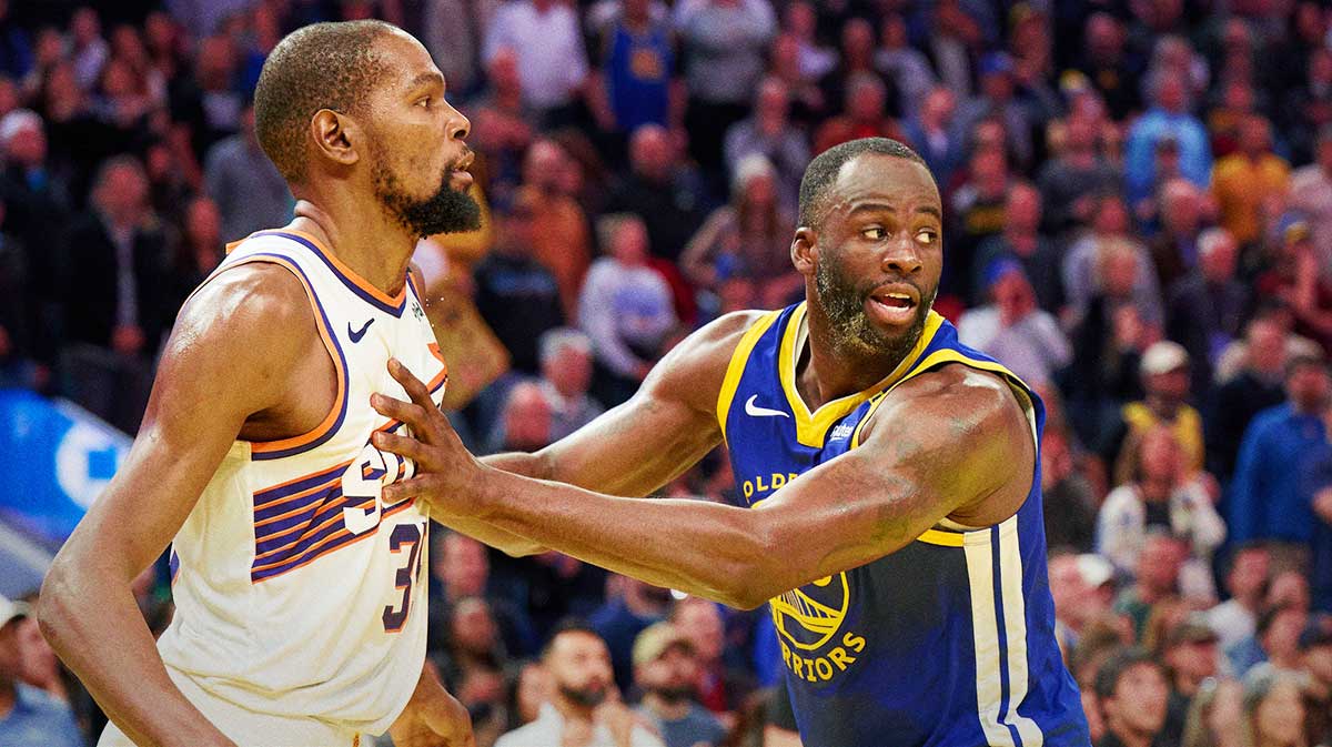 Golden State Warriors forward Draymond Green (23) defends against Phoenix Suns forward Kevin Durant (35) during the fourth quarter at Chase Center.