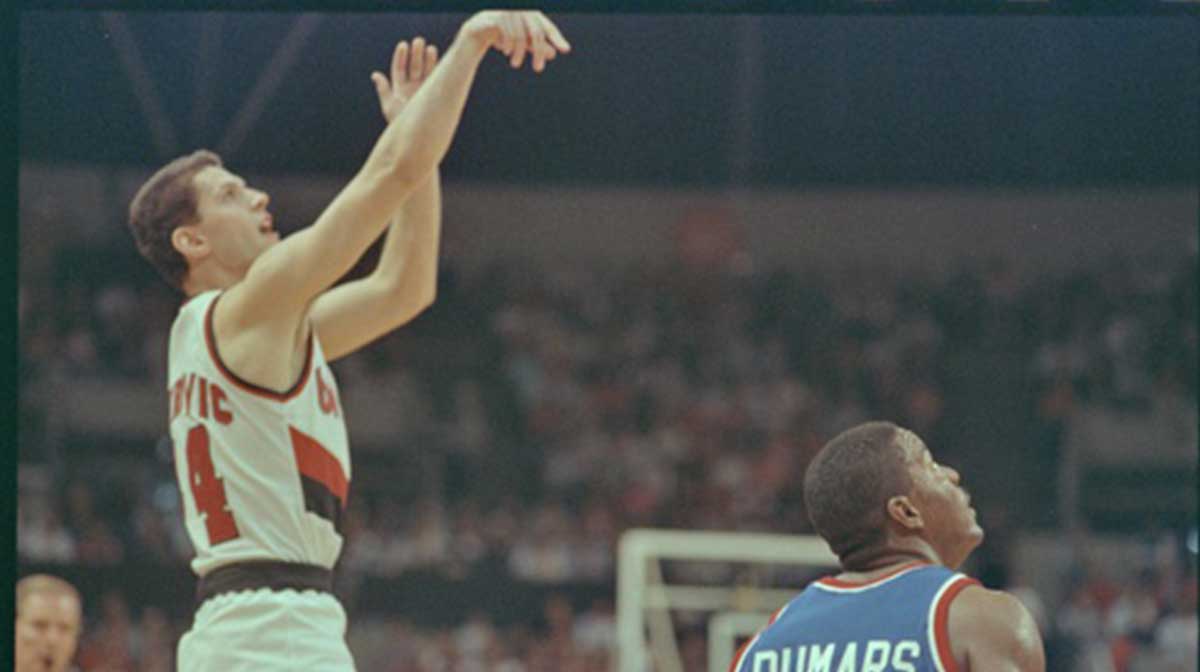 Trailblazers' Drazen Petrovic shoots the ball while being guarded by Pistons'' Joe Dumars during game three of the 1990 NBA Finals at The Memorial Coliseum.