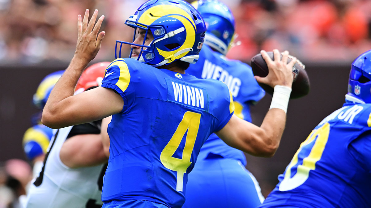 Los Angeles Rams quarterback Dresser Winn (4) throws a pass during the first half against the Cleveland Browns at Huntington Bank Field.
