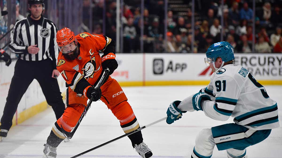 Anaheim Ducks defenseman Radko Gudas (7) shoots against the defense of San Jose Sharks right wing Carl Grundstrom (91) during the second period at Honda Center. 