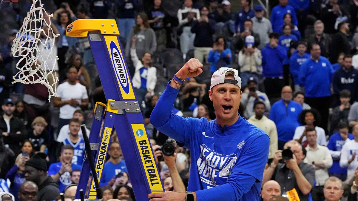 Duke Blue Devils head coach Jon Scheyer cuts down the net after the Duke Blue Devils beat the Alabama Crimson Tide in the East Regional final of the 2025 NCAA tournament at Prudential Center.
