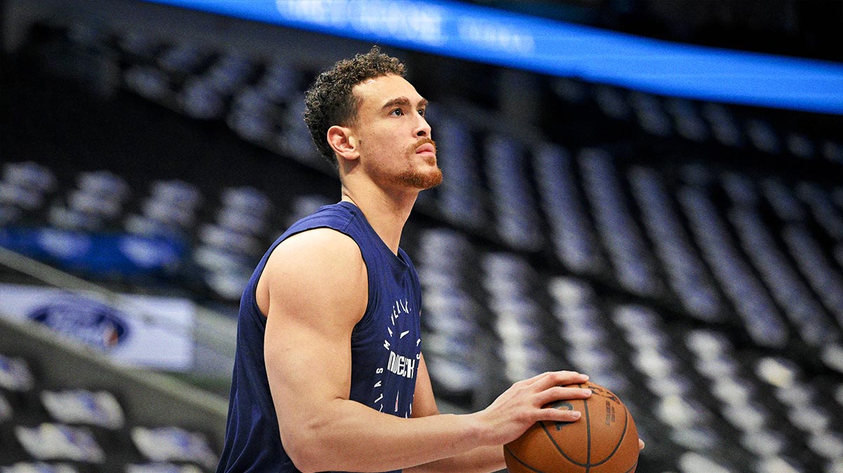 Dallas Mavericks center Dwight Powell (7) warms up before the game against the Brooklyn Nets at the American Airlines Center.