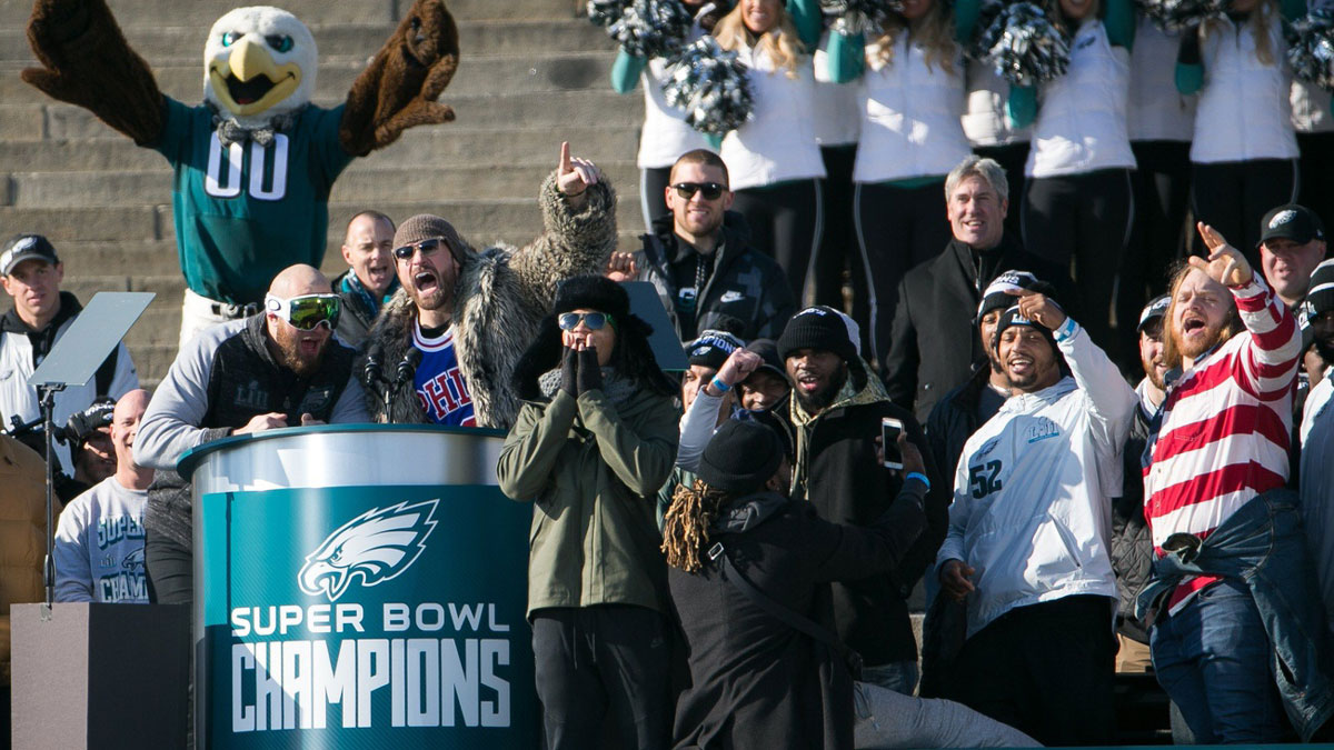 Lane Johnson and Chris Long get the fans pumped as thousands gather around the Rocky steps of the Philadelphia Museum of Art as the Super Bowl LII Champions Philadelphia Eagles parade down Broad Street ending at the art museum in Philadelphia.