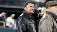 LSU Tigers former head coach Ed Orgeron watches a game between the Tulane Green Wave and the UCF Knights from the sidelines at Yulman Stadium.