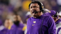 LSU Tigers head coach Ed Orgeron looks on during the first half against the Texas A&M Aggies at Tiger Stadium.