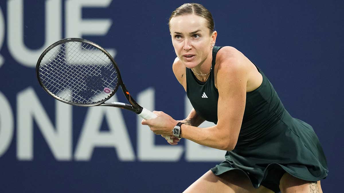 Elina Svitolina (UKR) tracks her shot against Naomi Osaka (JPN) in quarterfinal play at IGA Stadium.