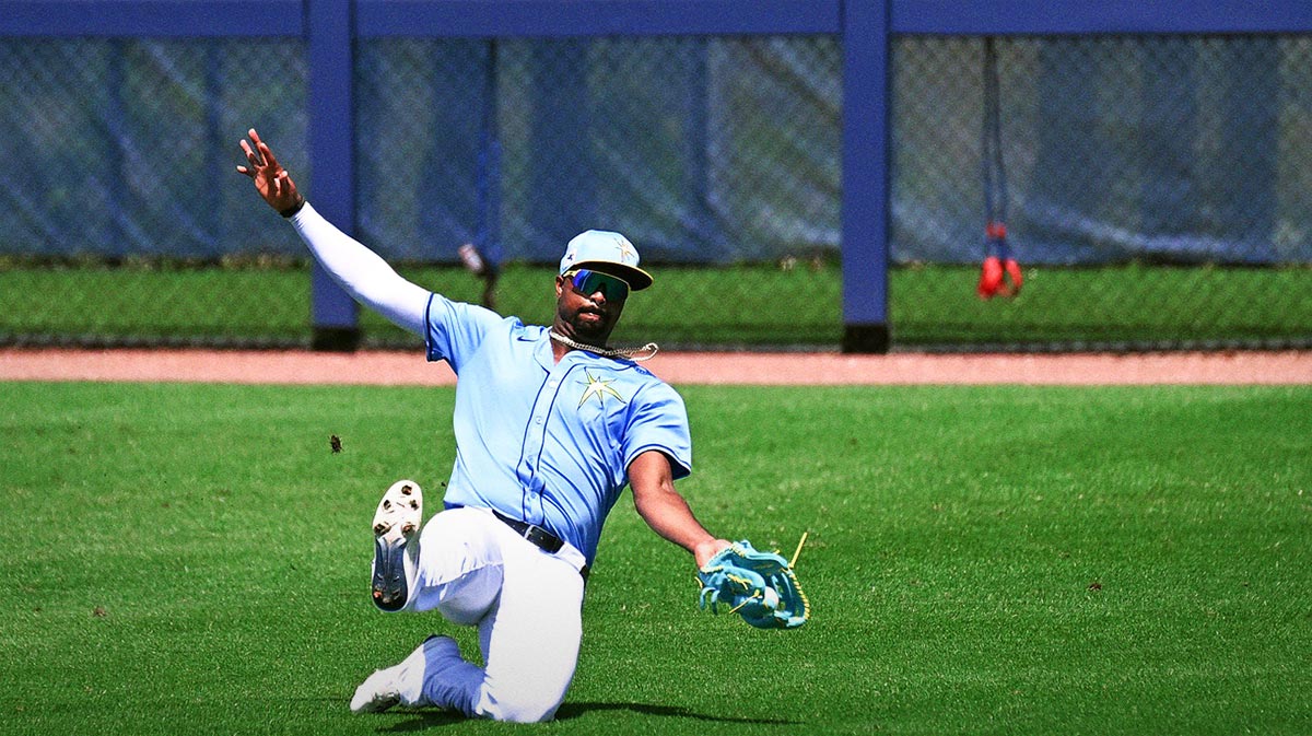 Tampa Bays Rays left fielder Eloy Jimenez (74) catches a line drive in the third inning against the Washington Nationals during spring training at Charlotte Sports Park.