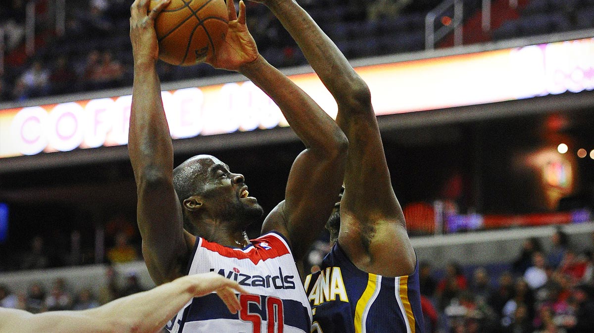 Washington Wizards center Emeka Okafor (50) drives to the basket as Indiana Pacers center Roy Hibbert (55) defends during the first half at the Verizon Center.