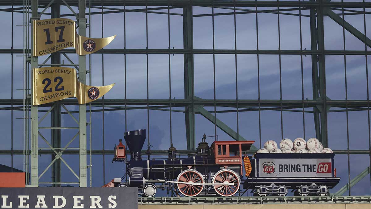 View of World Series banners and the train at Daikin Park during the game between the Houston Astros and the Tampa Bay Rays.