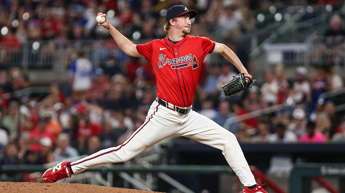 Atlanta Braves pitcher Erick Fedde (22) pitches the ball against the New York Mets during the fifth inning at Truist Park.