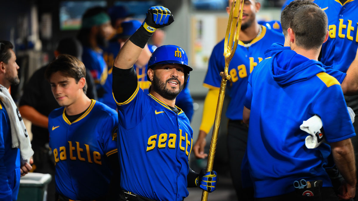 Seattle Mariners third baseman Eugenio Suarez (28) celebrates in the dugout after hitting a home run against the Athletics during the fifth inning at T-Mobile Park.