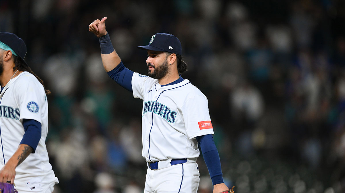 Seattle Mariners third baseman Eugenio Suarez (28) interacts with fans after the game against the Chicago White Sox at T-Mobile Park.