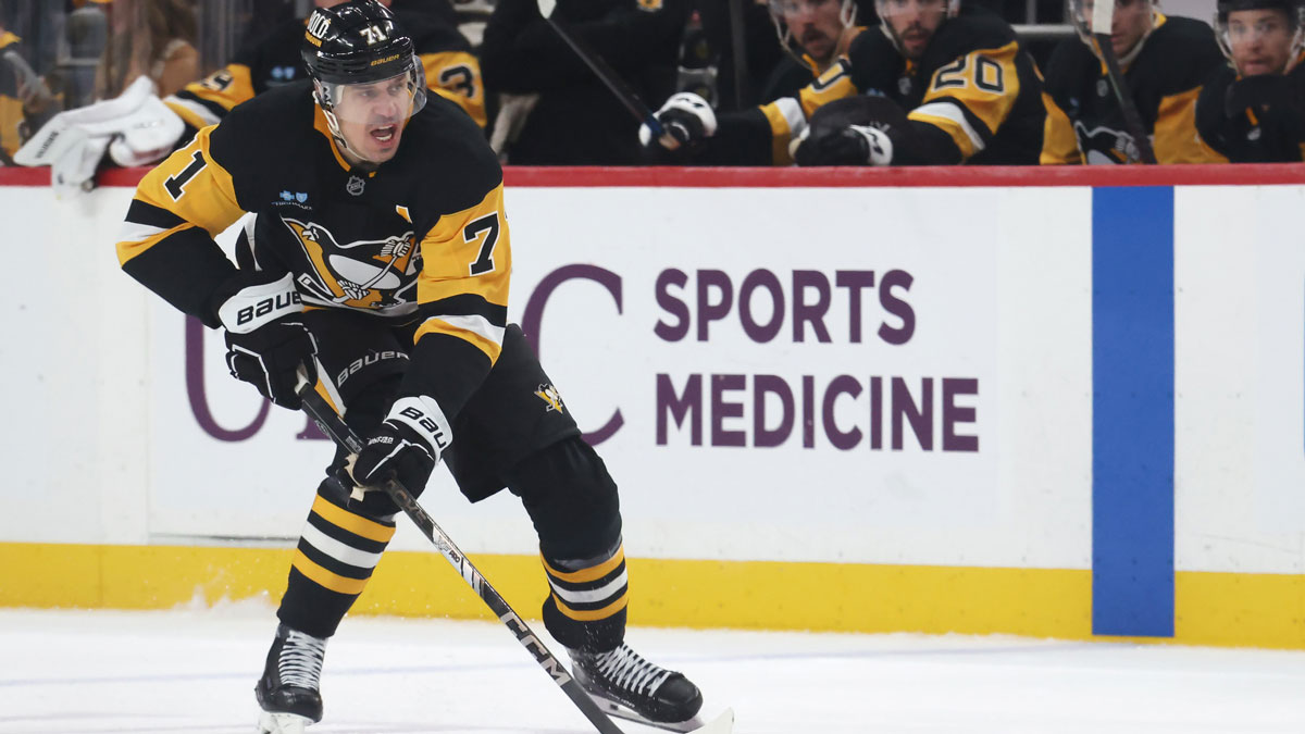Pittsburgh Penguins center Evgeni Malkin (71) skates with the puck against the Boston Bruins during the third period at PPG Paints Arena.