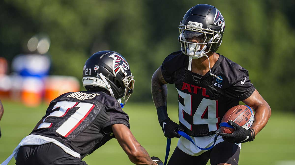 Atlanta Falcons cornerbacks Mike Hughes (21) and A.J. Terrell (24) take part in a drill during training camp at IBM Performance Field.