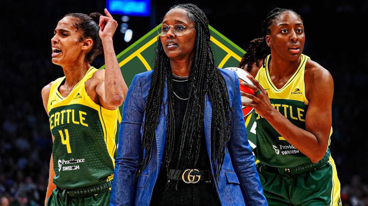 WNBA Storm coach Noelle Quinn (front, center) with Storm PG Skylar Diggins and Storm PF Nneka Ogwumike. Seattle Storm logo in background