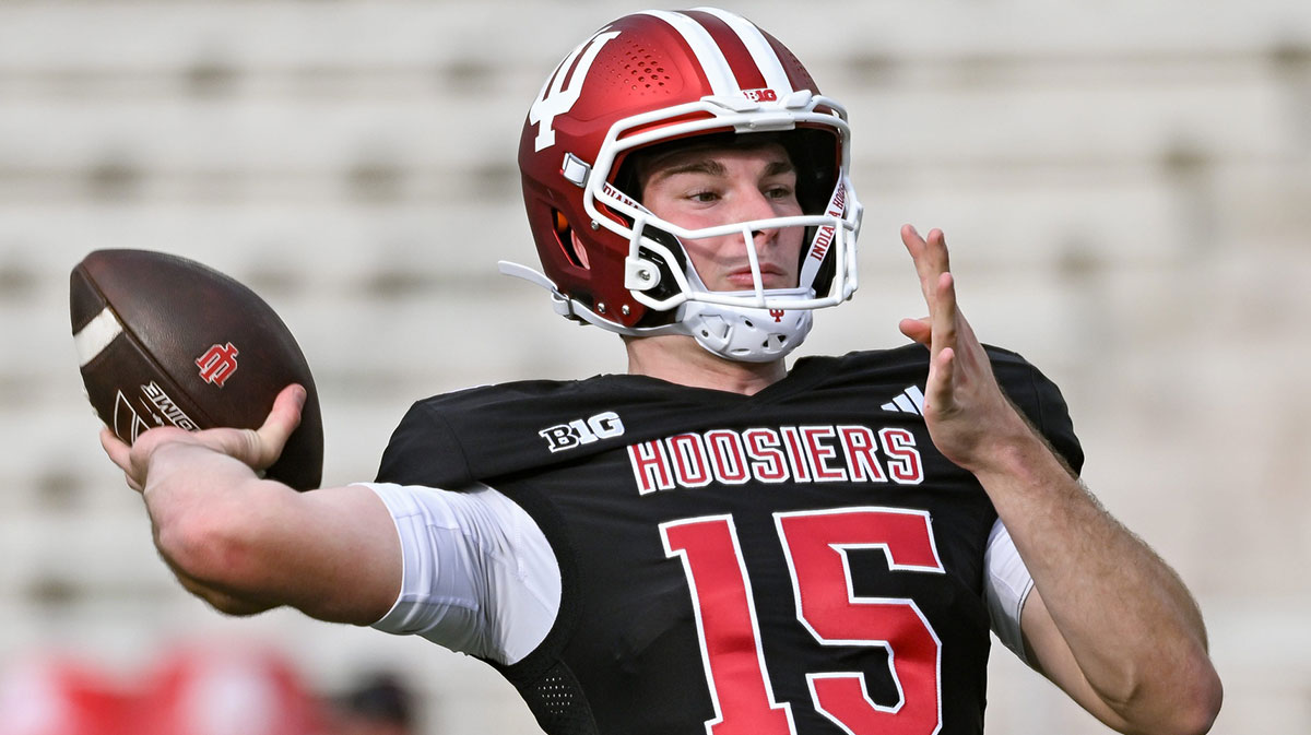 Indiana’s Fernando Mendoza (15) throws a pass during spring practice