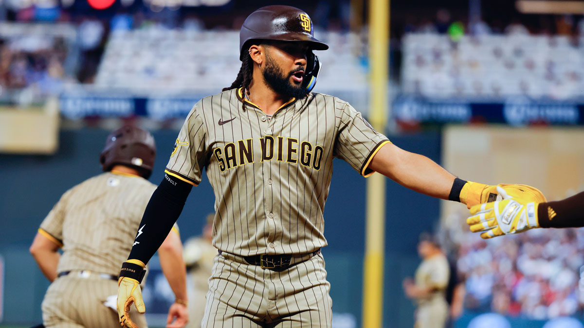 San Diego Padres right fielder Fernando Tatis Jr. (23) celebrates his run against the Minnesota Twins in the seventh inning at Target Field.