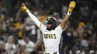 San Diego Padres right fielder Fernando Tatis Jr. (23) celebrates as he scores during the eighth inning against the Los Angeles Dodgers at Petco Park.
