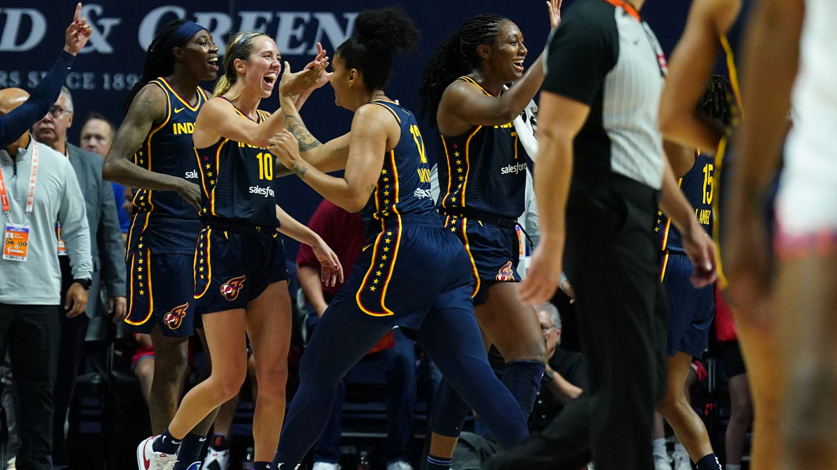 Indiana Fever head coach Stephanie White reacts with guard Kelsey Mitchell (0) from the sideline as they take on the Connecticut Sun at Mohegan Sun Arena.