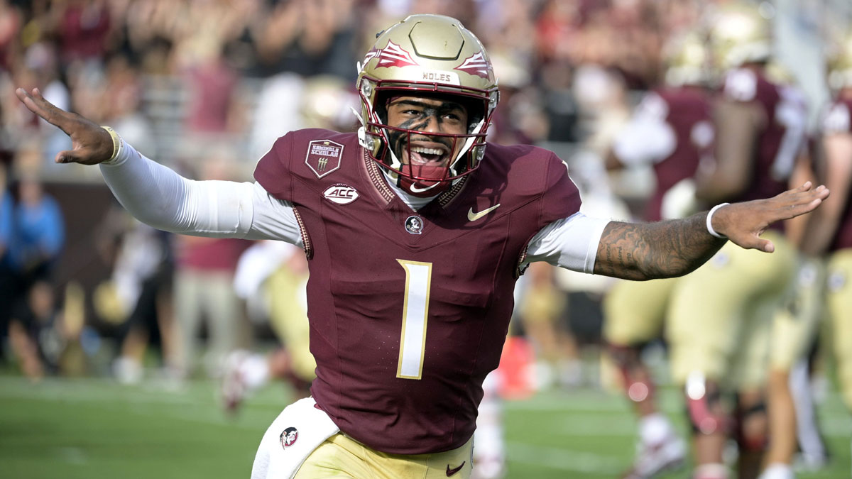 Florida State Seminoles quarterback Tommy Castellanos (1) celebrates after a touchdown against the Alabama Crimson Tide during the second half at Doak S. Campbell Stadium.