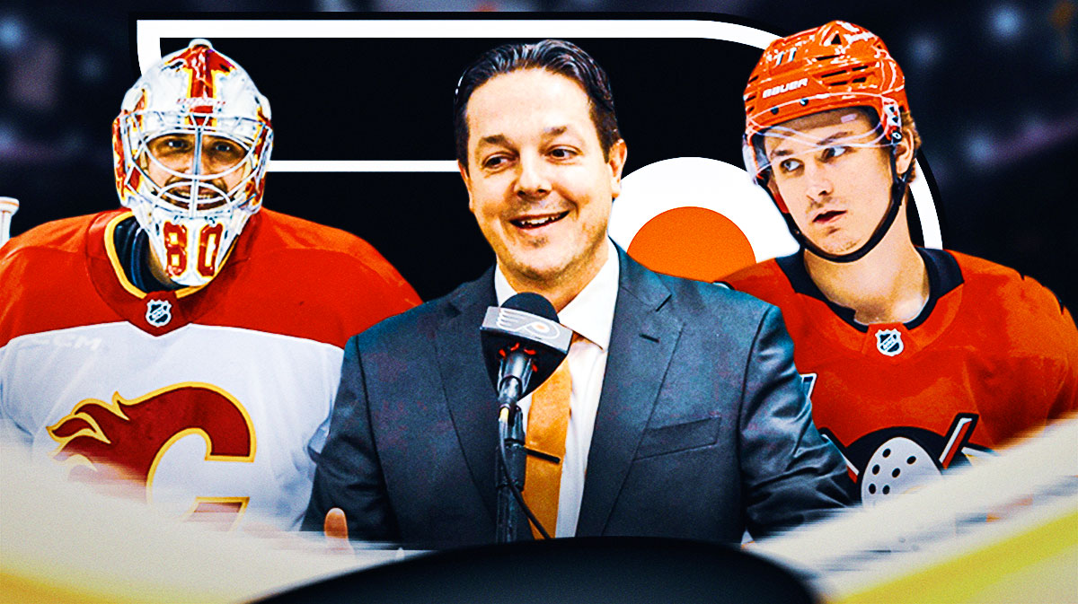 Dan Vladar and Trevor Zegras on the outsides. GM Daniel Briere in the middle. Flyers logo in the background.