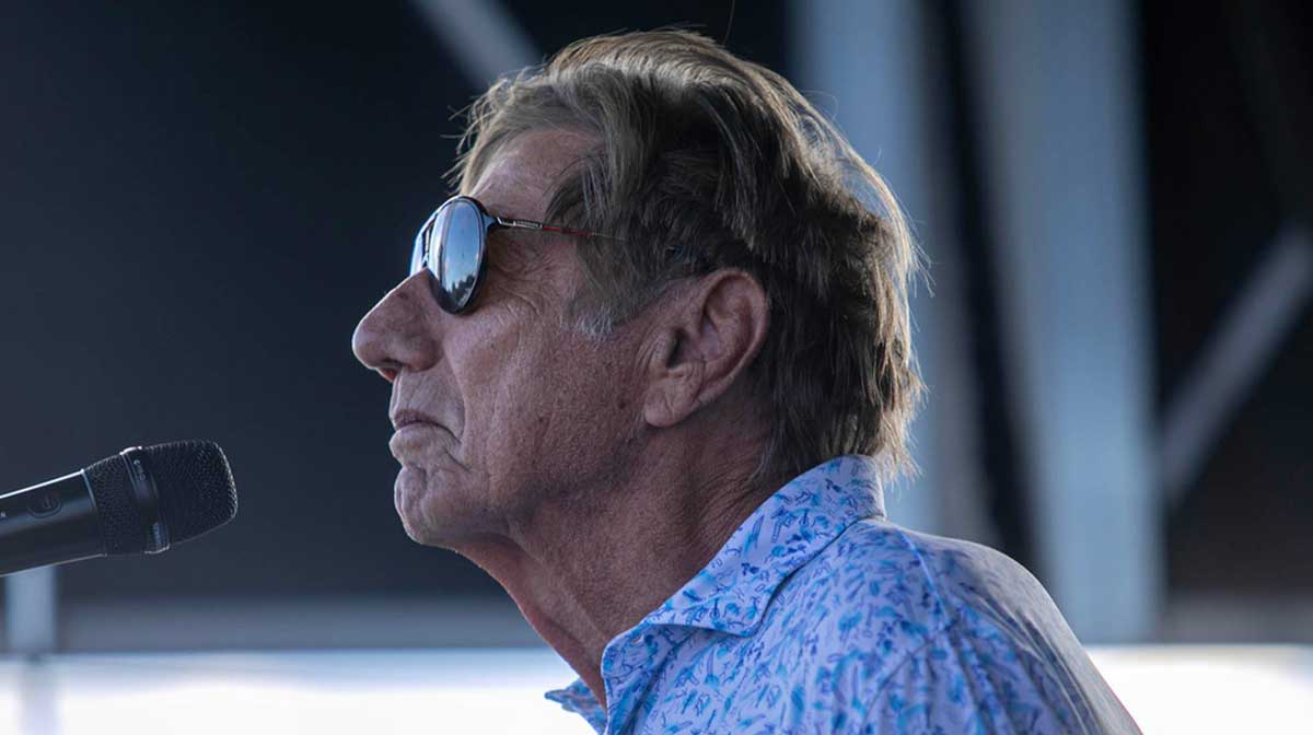 oe Namath addressing the crowd at the thirteenth annual Tequesta Chili Cook-Off.
