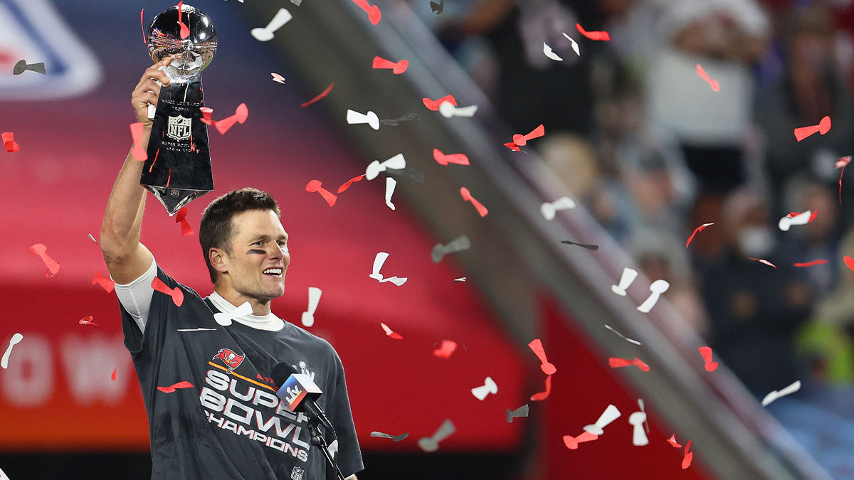 Tampa Bay Buccaneers quarterback Tom Brady (12) hoists the Vince Lombardi Trophy after defeating the Kansas City Chiefs in Super Bowl LV at Raymond James Stadium.